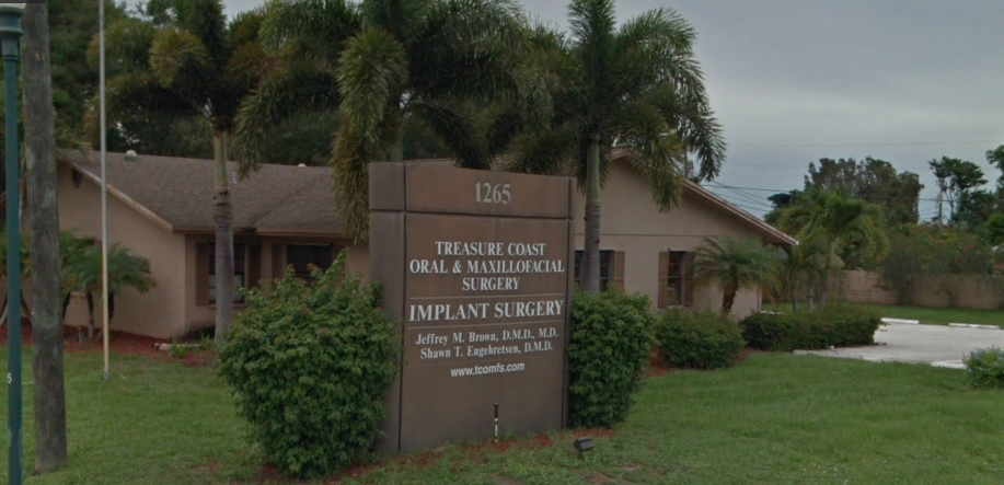 office sign for Treasure Coast Oral & Maxillofacial Surgery & Dental Implant Surgery Center